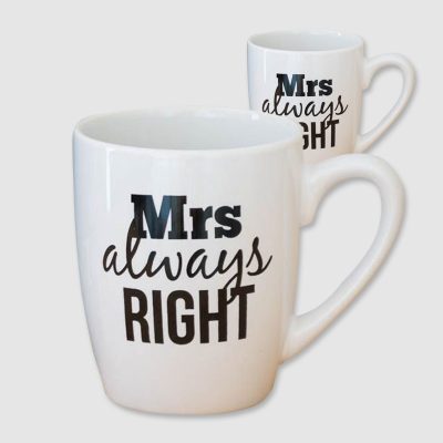 white mug with black messages