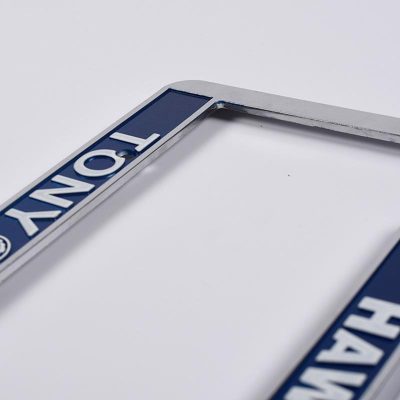 closeup back view of Chrome Faced Engraved License Frame